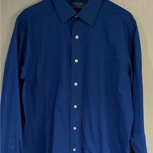 Long sleeve button-down, collared dress shirt.